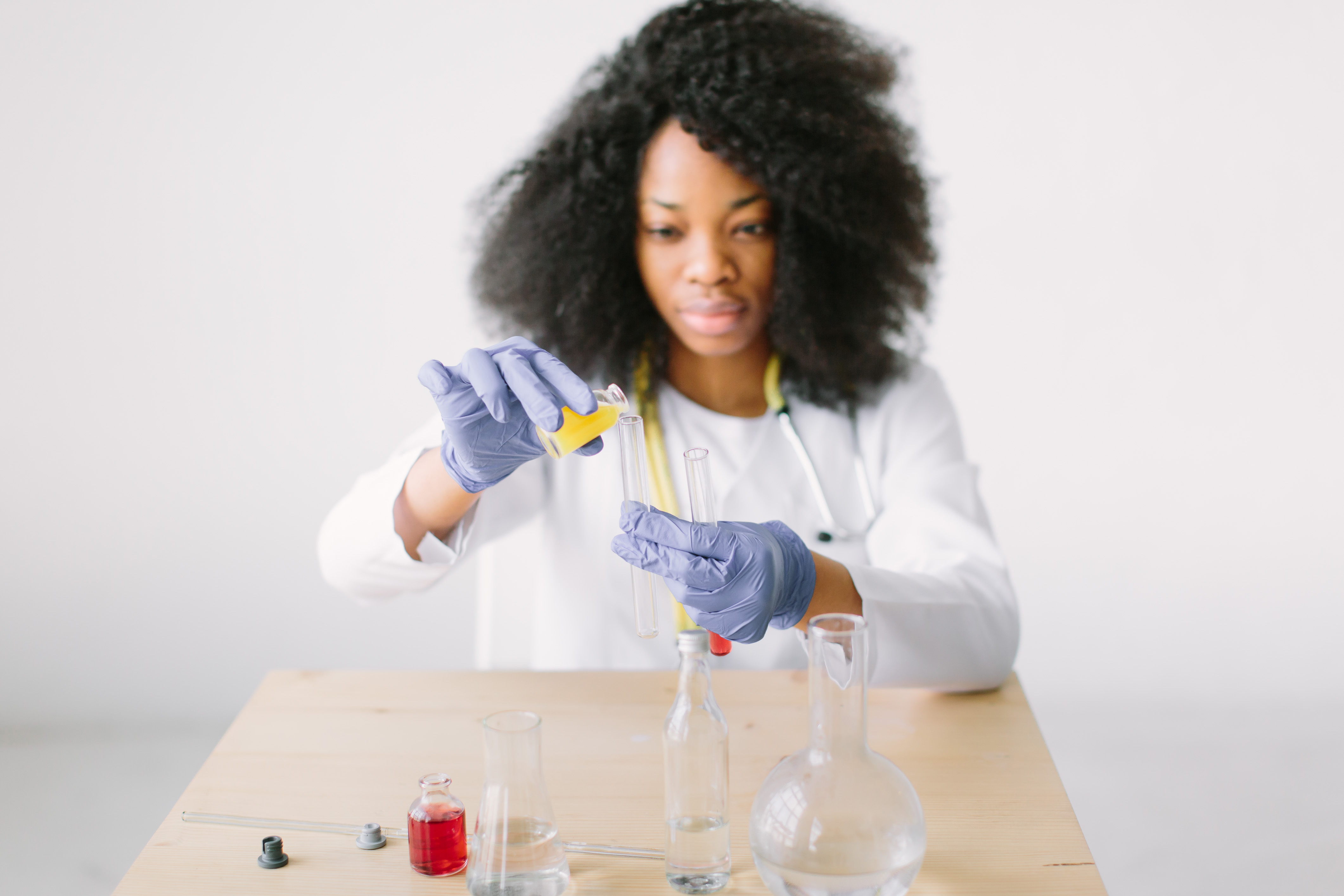 girl doing science experiment