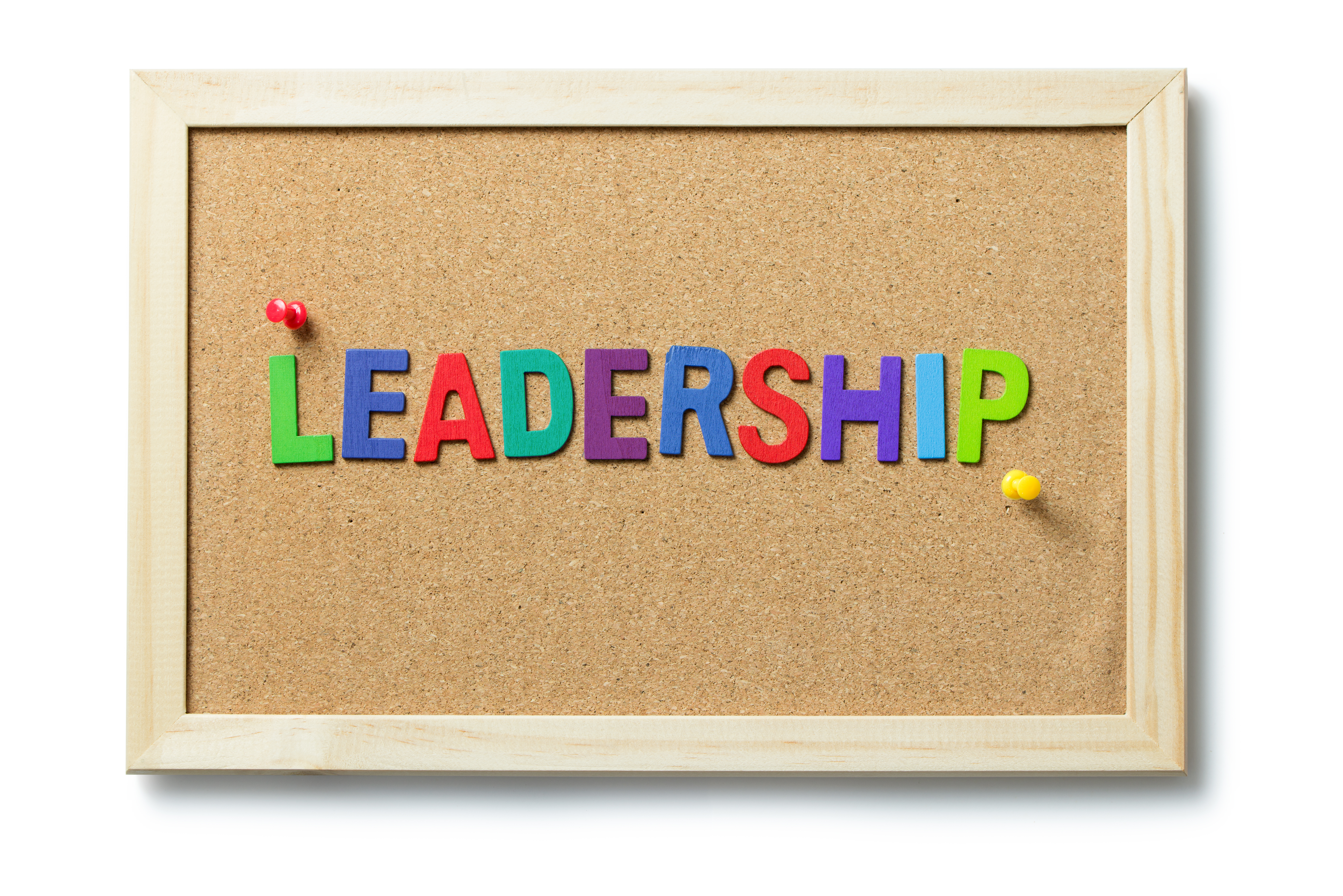 The word leadership on a bulletin board