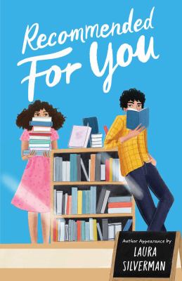 Cover of the book titled Recommended for You by Laura Silverman. Cover is blue with a teen girl holding a stack of books and teen boy leaning on a bookshelf reading a book.