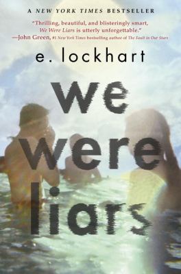 Cover of the book titled We Were Liars by E. Lockhart. Cover shows two boys and a girl with long hair in a body of water like an ocean with a sky with some fluffy white clouds.