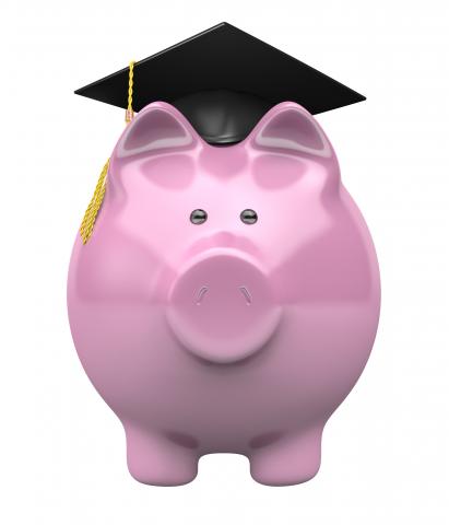 Piggy bank with graduation cap