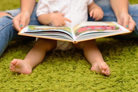 Baby with book