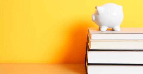 Piggy bank on books