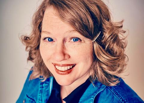 Headshot of author Katherine Center, a woman with dark blond hair and blue eyes.