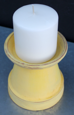 candle holder made from a terra cotta pot and saucer
