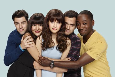 The five cast members of the TV show: Schmidt, Cece, Jake, and Winston stand with their arms around Jess, who is standing in the middle.