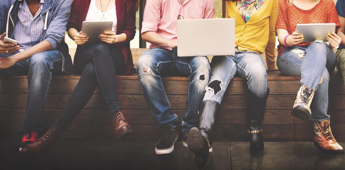 Teens sitting together image