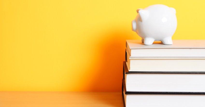 Piggy bank on books