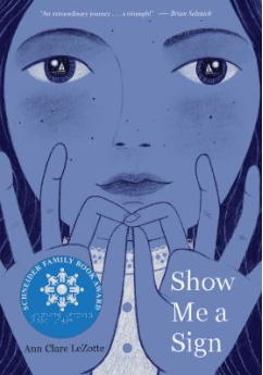 Cover of Show Me a Sign by Ann Clare LeZotte in bluetone with a girl holding her fingers up in sign language