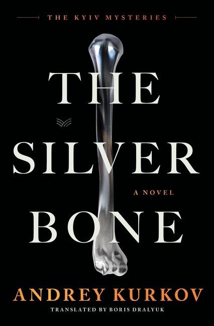This simple cover features a shiny silver bone against a black background.